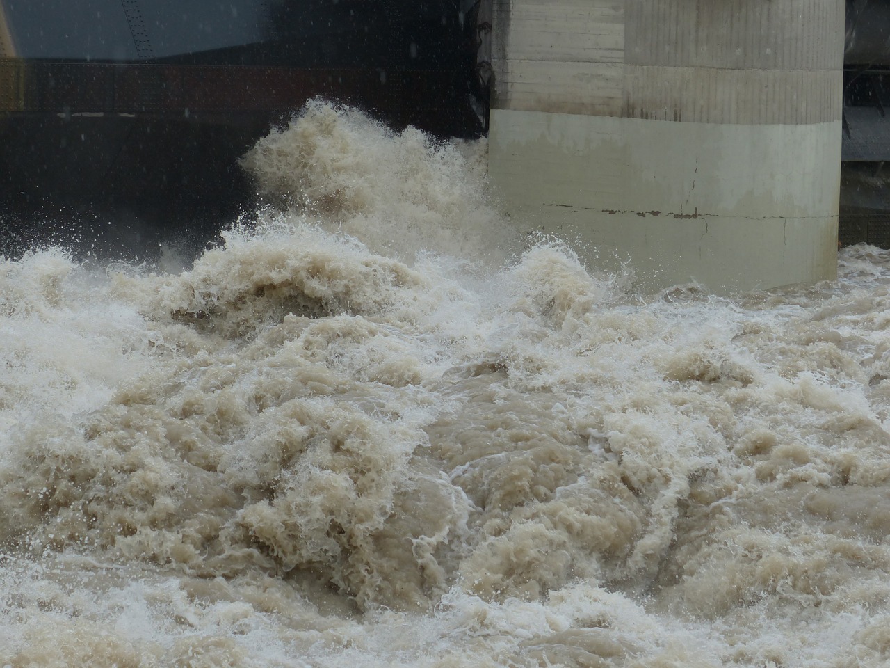 a man riding a wave on top of a surfboard, a picture, hurufiyya, flooded station, loosely cropped, massive river, [ closeup ]!!