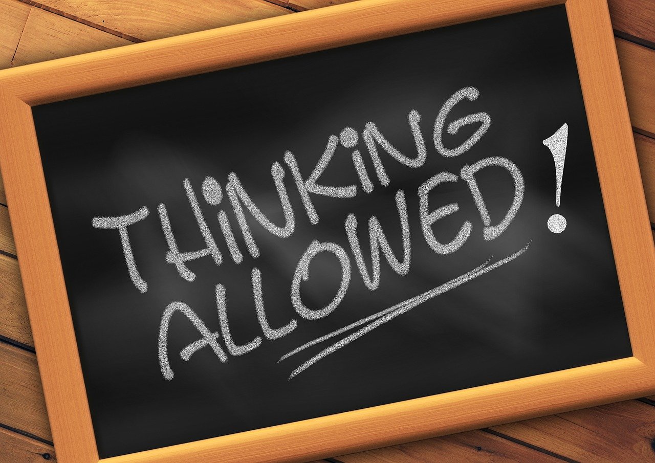 a chalkboard with the words thinking allowed written on it, a cartoon, by Gawen Hamilton, trending on pixabay, law aligned, think in 3 d, bottom shot, stock photo