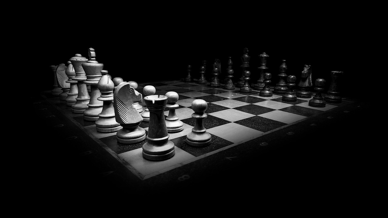 a black and white photo of a chess board, a black and white photo, by Kristian Kreković, pexels, figuration libre, iphone wallpaper, darkness's background, gearing up for battle, photo taken with an iphone