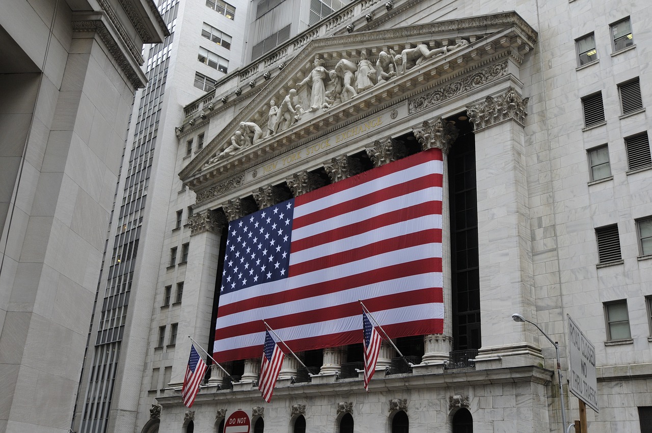 a large american flag hanging from the side of a building, trading stocks, high res, new york, watch photo
