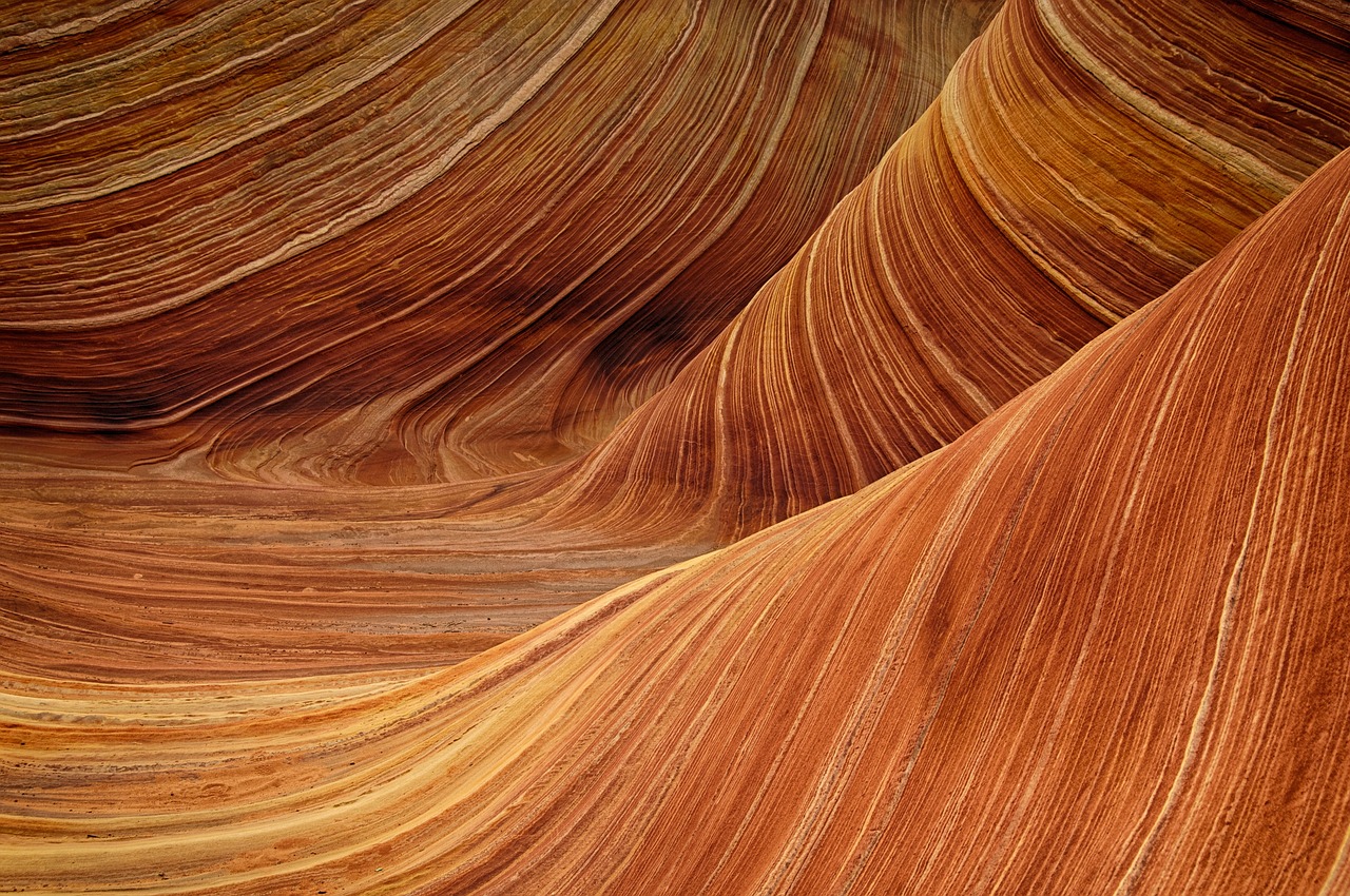 a close up of a wave formation in the desert, art nouveau, colored marble, wide angle”, intricate ”