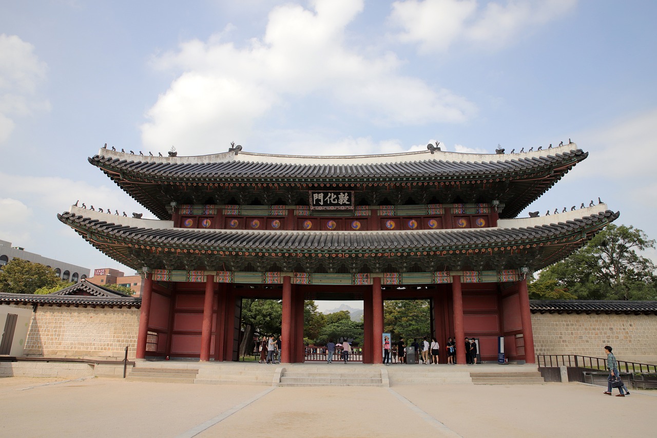 a group of people standing in front of a building, a picture, inspired by Kim Hong-do, shutterstock, cloisonnism, huge gate, view from ground level, sangyeob park, throne room