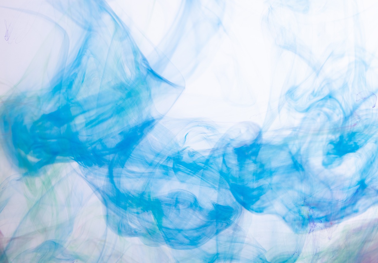 a close up of blue and green ink in water, inspired by Kim Keever, lyrical abstraction, graffiti _ background ( smoke ), light blue pastel background, abstract rippling background, shot from below