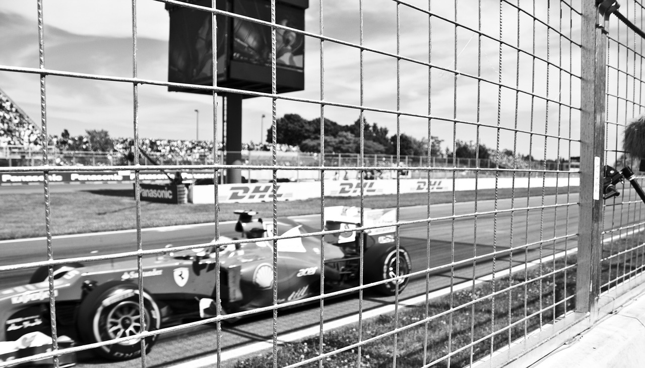 a black and white photo of a race car, a black and white photo, by Federico Zuccari, reddit, purism, fences, photo taken with an iphone, f 1/4, kimi vera