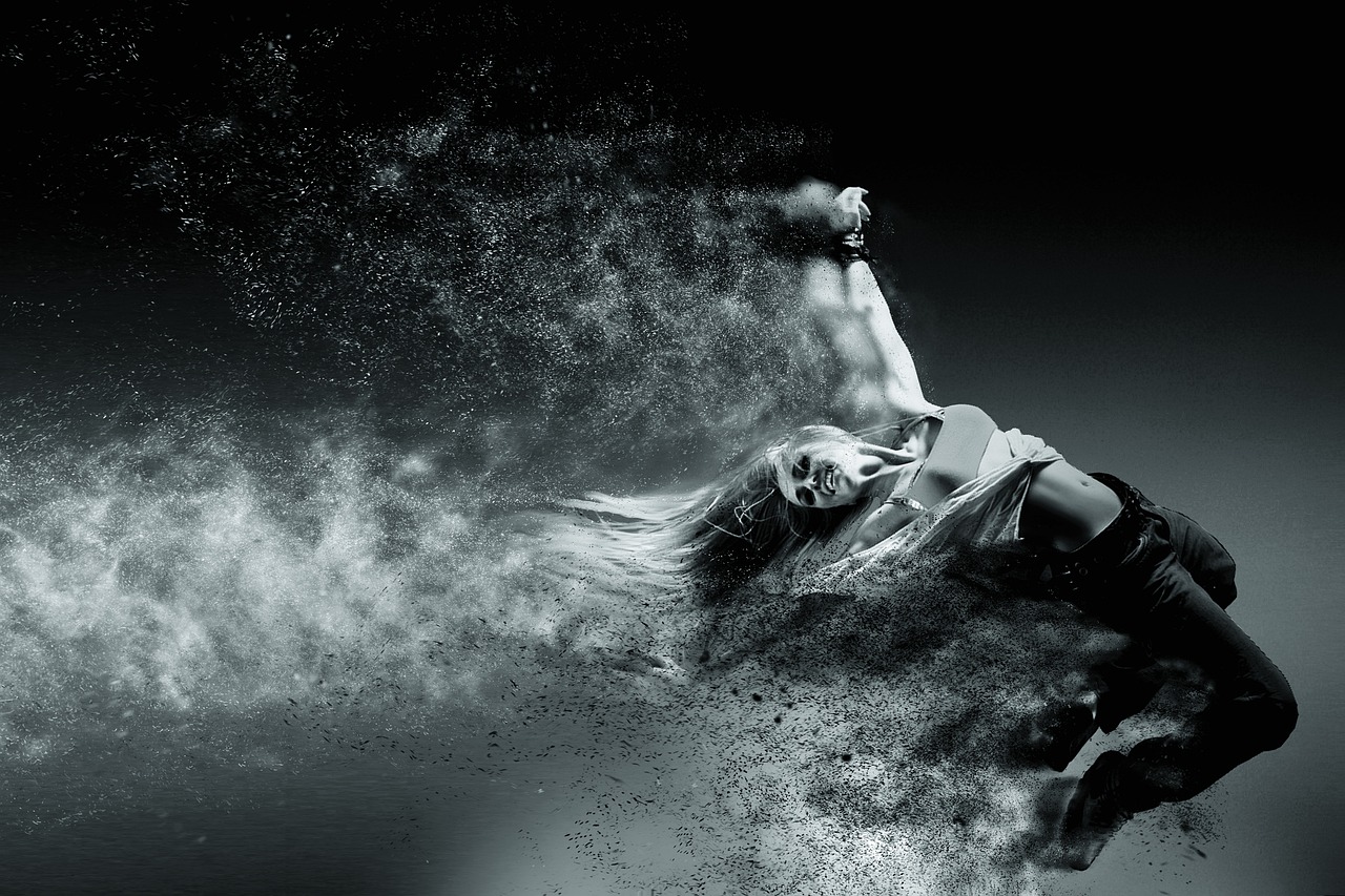 a black and white photo of a woman jumping in the air, digital art, inspired by Maciej Kuciara, sand particles, photo from a promo shoot, lying on an abstract, stunning action poses
