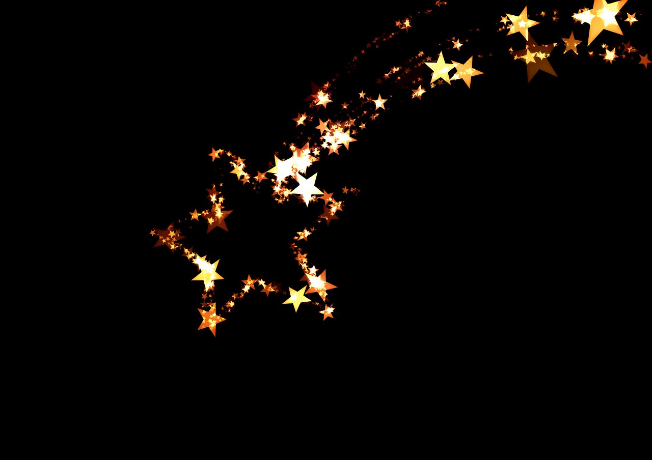 a close up of a star shaped object on a black background, digital art, fairy lights, warm and joyful atmosphere, shooting stars, golden embers flying