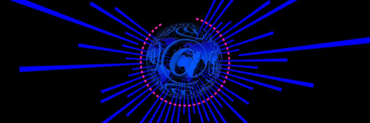 a close up of a clock on a black background, a digital rendering, pixabay, computer art, blue circular hologram, wires earth background, blue black pink, sphere
