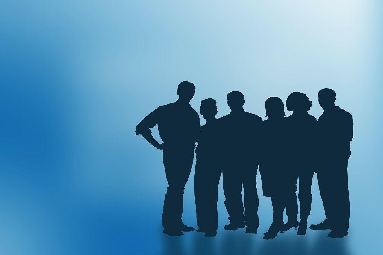 a group of people standing next to each other, by Mirko Rački, trending on pixabay, digital art, blue backgroung, corporate photo, banner, in 2 0 1 2