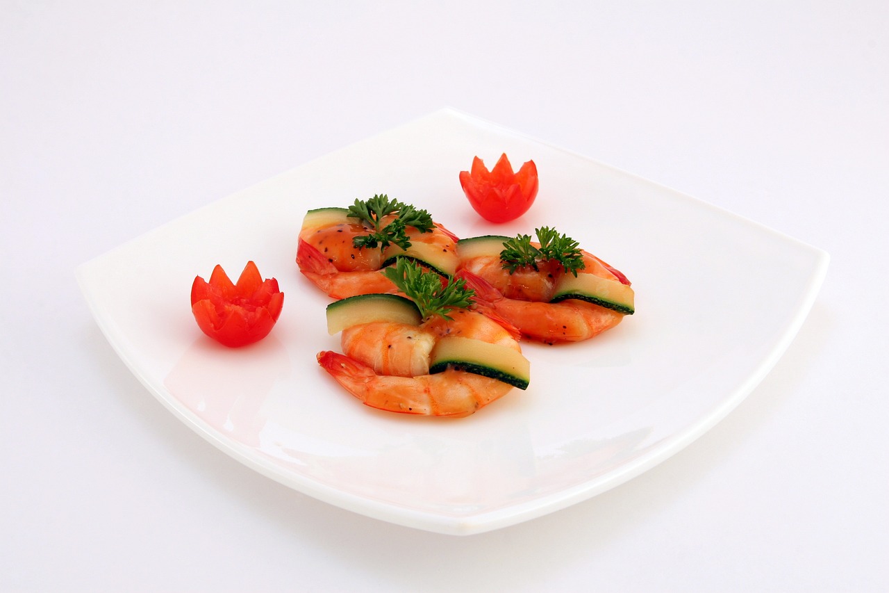 a white plate topped with shrimp and vegetables, a picture, by Aleksander Gierymski, product introduction photo, daoshu, great quality ), also one tomato slice