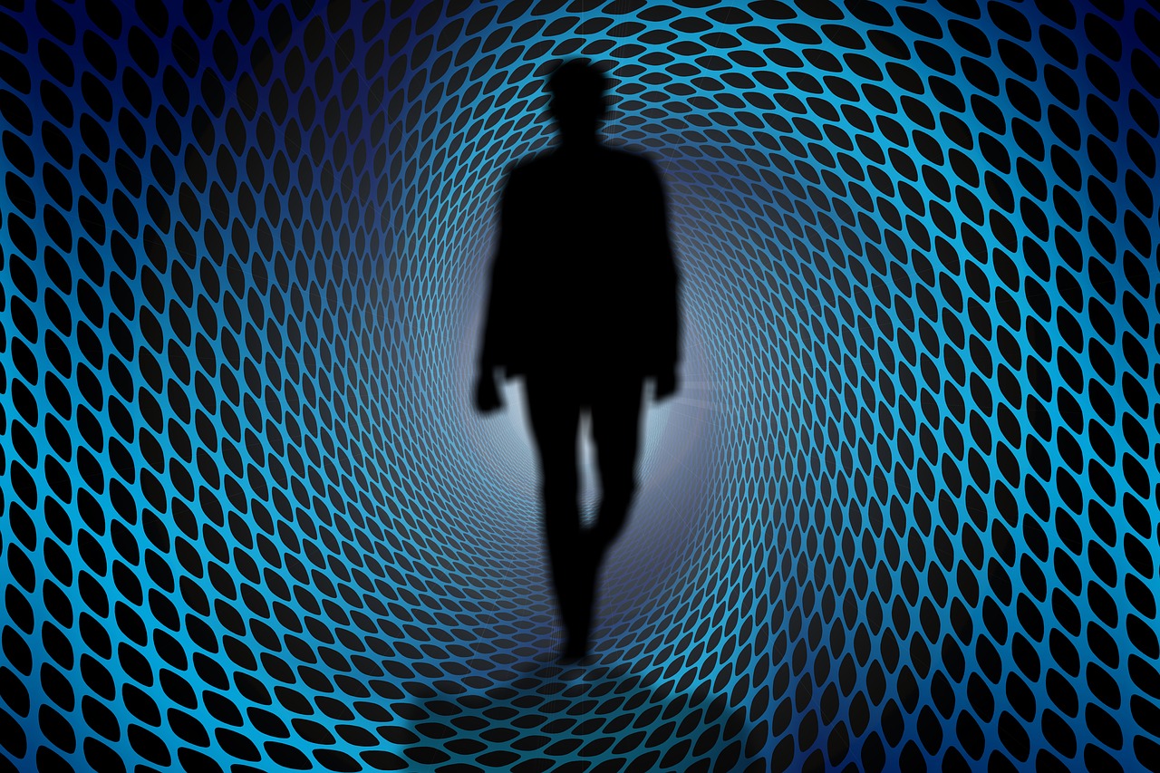 a silhouette of a man walking through a tunnel, digital art, torus energy, maze-like, business, in the astral plane ) ) )