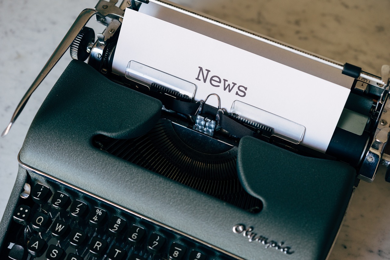 a close up of a typewriter on a table, news coverage, an illustration, completely new, currents