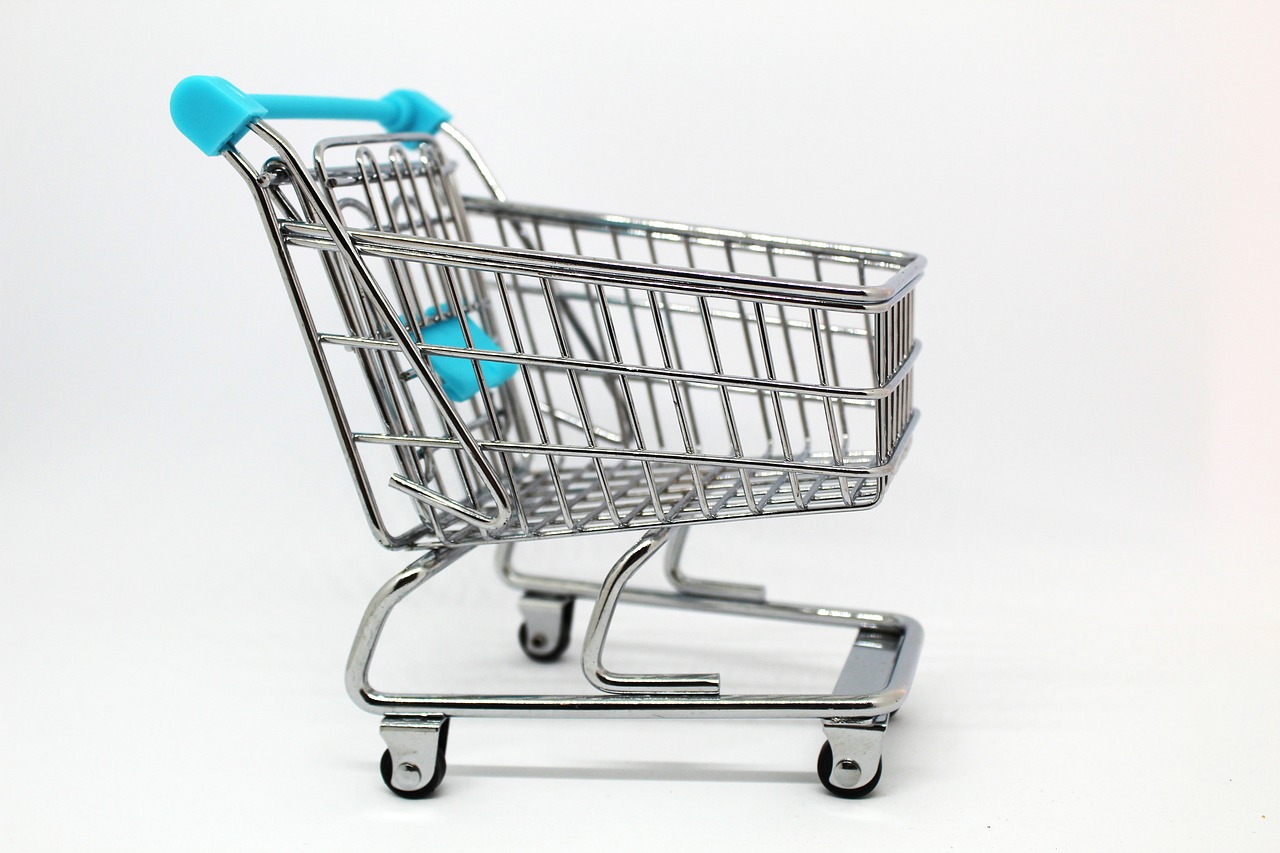 a miniature shopping cart sitting on top of a table, figuration libre, detailed product photo, istockphoto, photo taken in 2018, product introduction photo