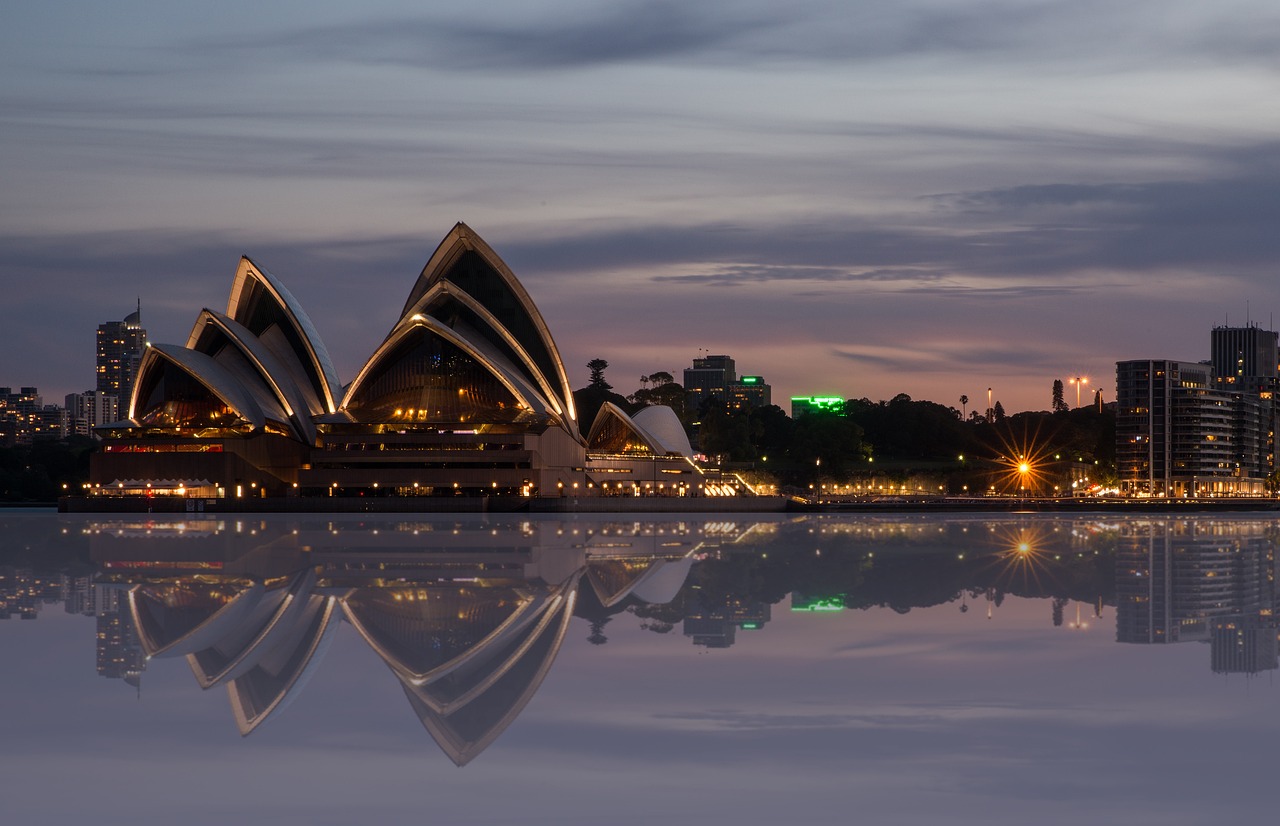 a reflection of the sydney opera house in the water, a matte painting, inspired by Sydney Carline, shutterstock, early dawn, stock photo
