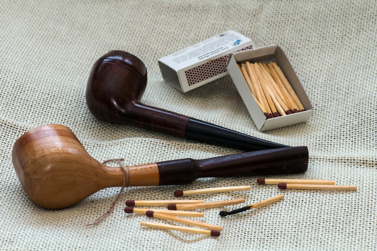 a wooden pipe sitting next to a box of matches, renaissance, miniature product photo, needles, product photograph, ivan shishk