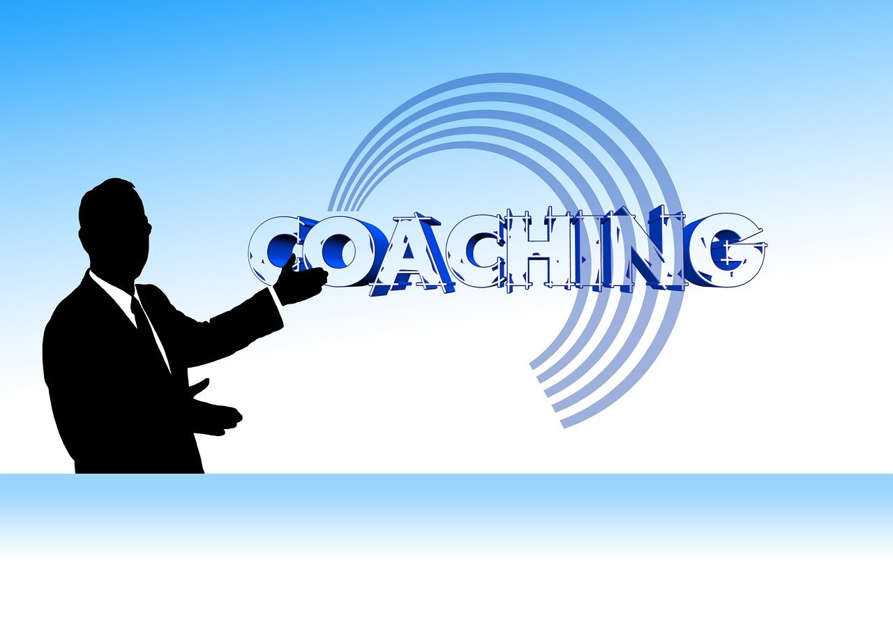 a man in a suit pointing at the word coaching, by Mirko Rački, trending on pixabay, action painting, dominant wihte and blue colours, background is white and blank, singing, p. j. n