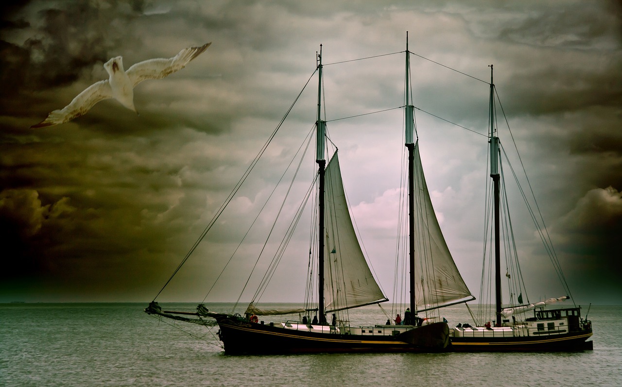 a sailboat in a body of water under a cloudy sky, a digital rendering, pixabay contest winner, romanticism, twins, old color photo, ravens stormy sky of foreboding, tourist photo