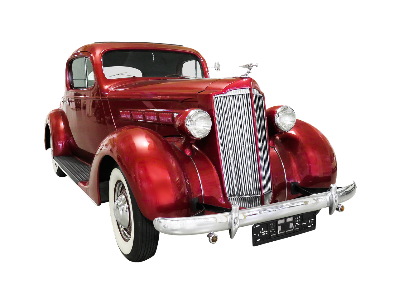 a red classic car on a black background, gleaming silver and rich colors, 1936, stained antique copper car paint, 3/4 front view