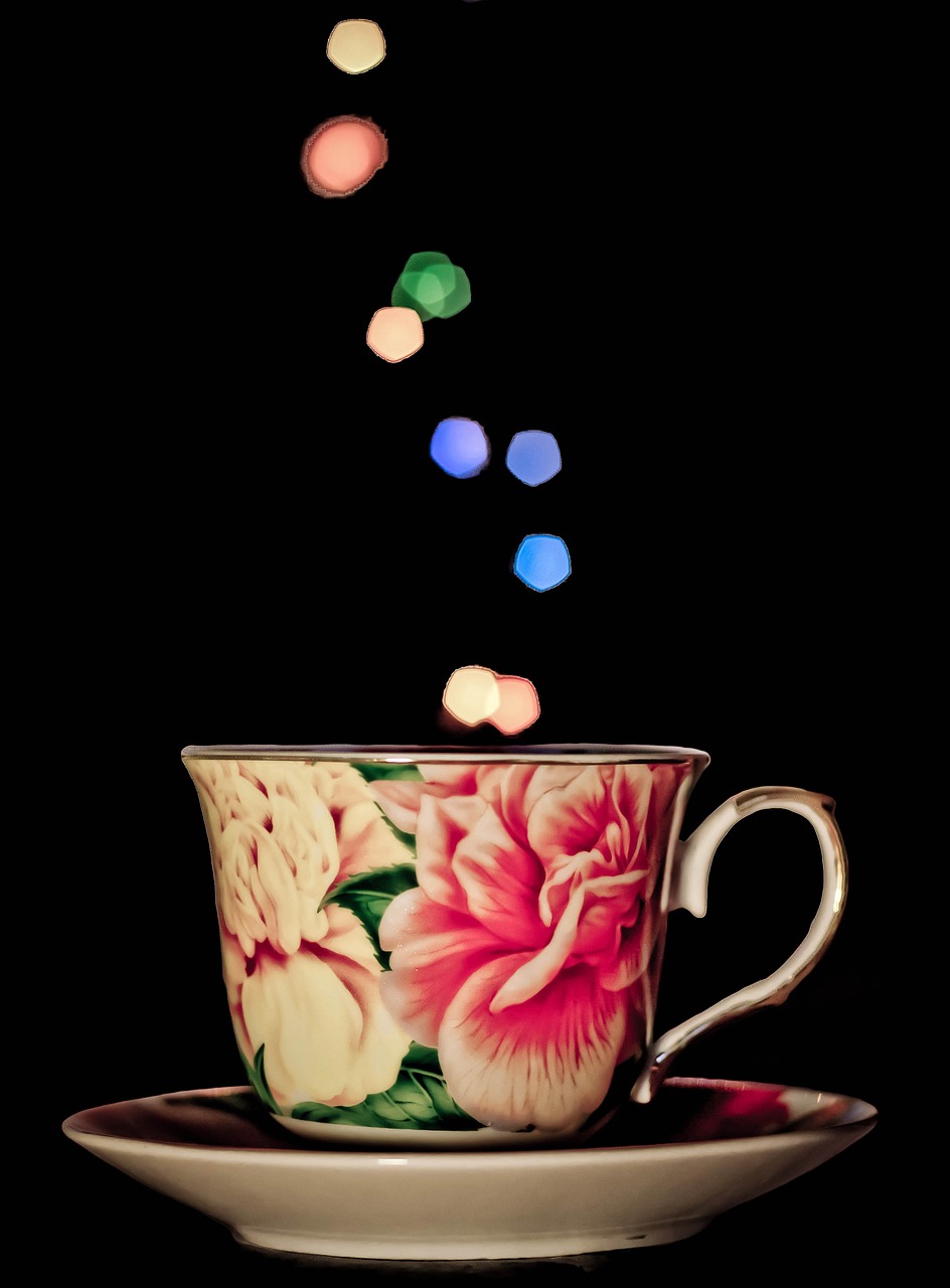 a tea cup sitting on top of a saucer, digital art, pexels, lights with bloom, polka dot, mid shot photo, in front of a black background