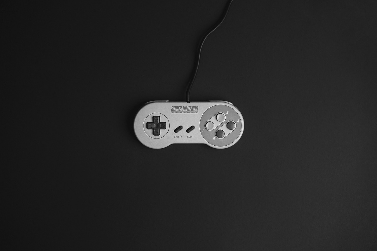 a close up of a video game controller, an ambient occlusion render, inspired by Mario Comensoli, unsplash, digital art, on grey background, retro dark vintage, miniature product photo, snes screenshot