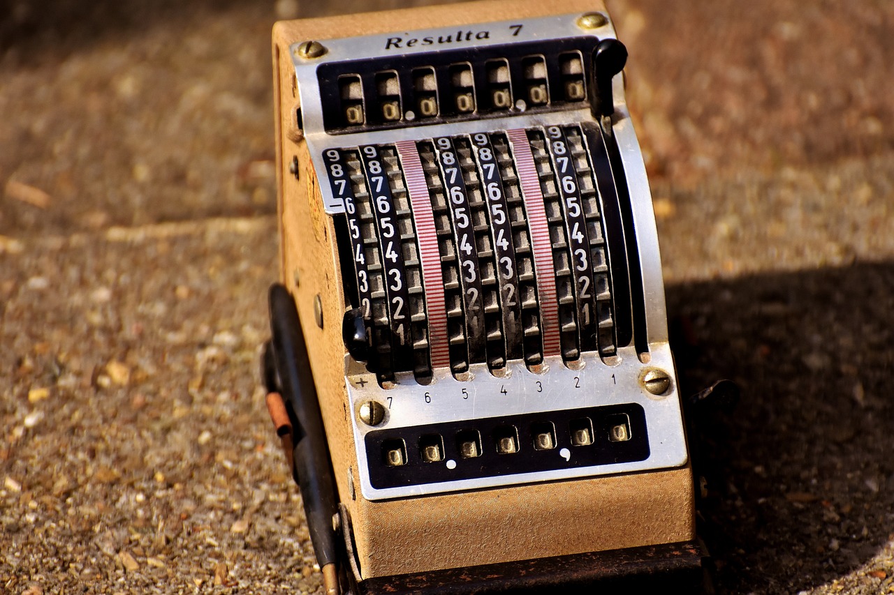 a machine that is sitting on the ground, by Raymond Coxon, unsplash, les automatistes, dividing it into nine quarters, algebra, vintage old, # 7 3 c 2 fb
