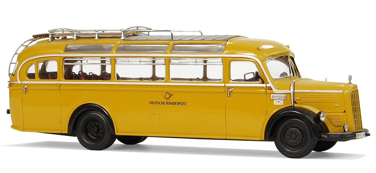 a yellow bus is parked on a white surface, by Leo Goetz, stunning model, restored, details, goat