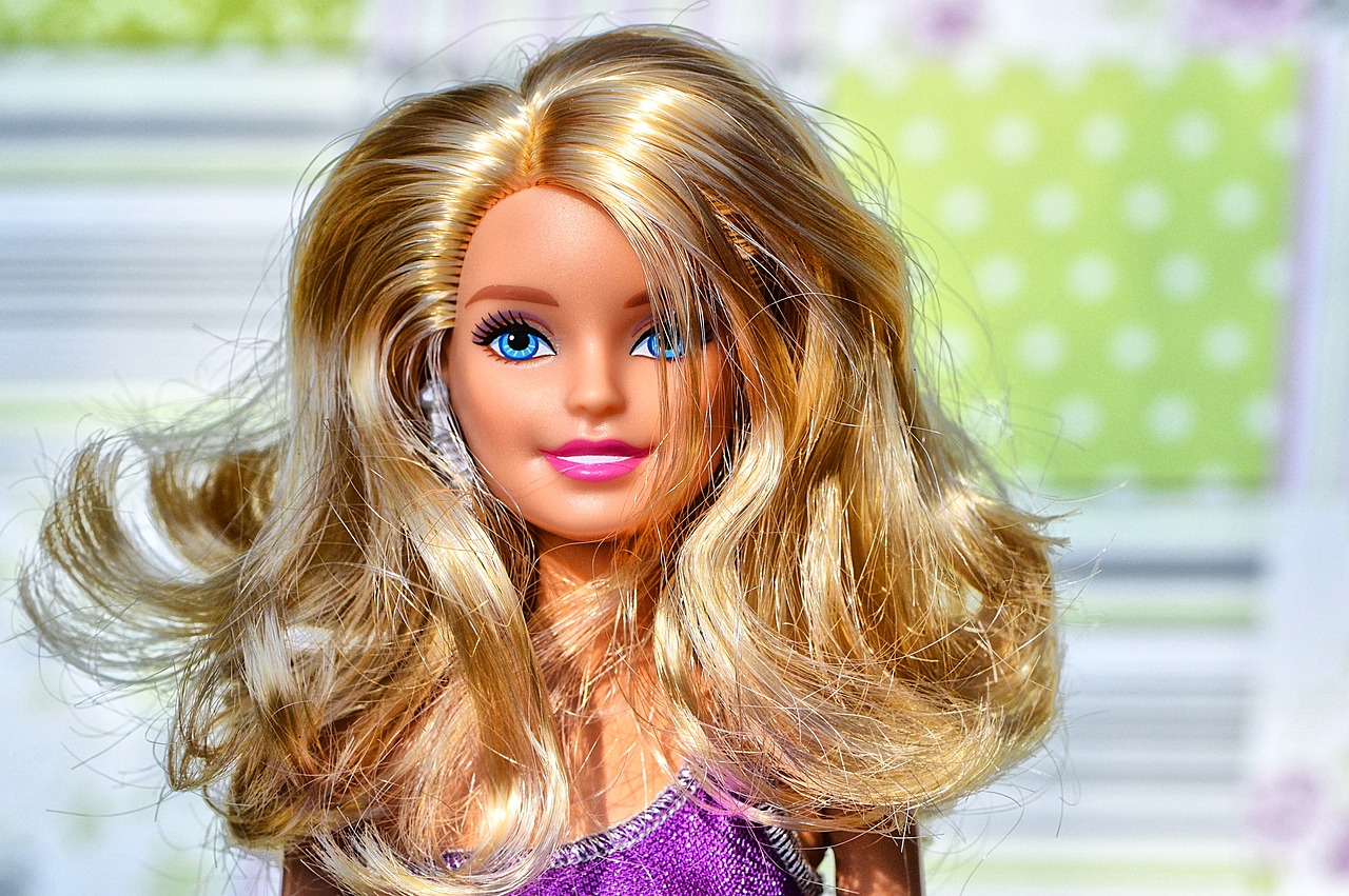 a barbie doll with blonde hair and blue eyes, a picture, by Tom Carapic, pixabay, istockphoto, her loose hair, toy commercial photo, two color hair