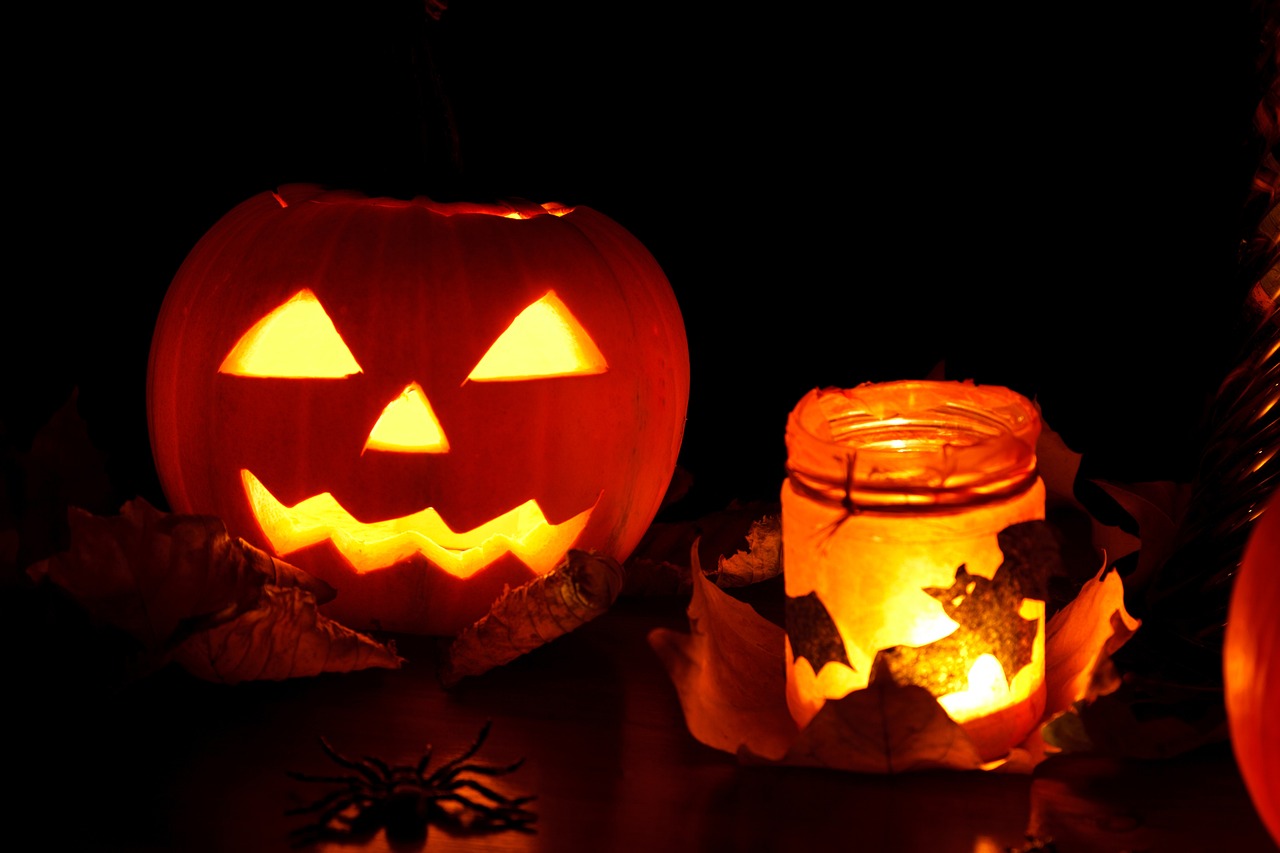 a couple of pumpkins sitting on top of a table, shutterstock, vanitas, lantern candle, 555400831, horror details, stock photo