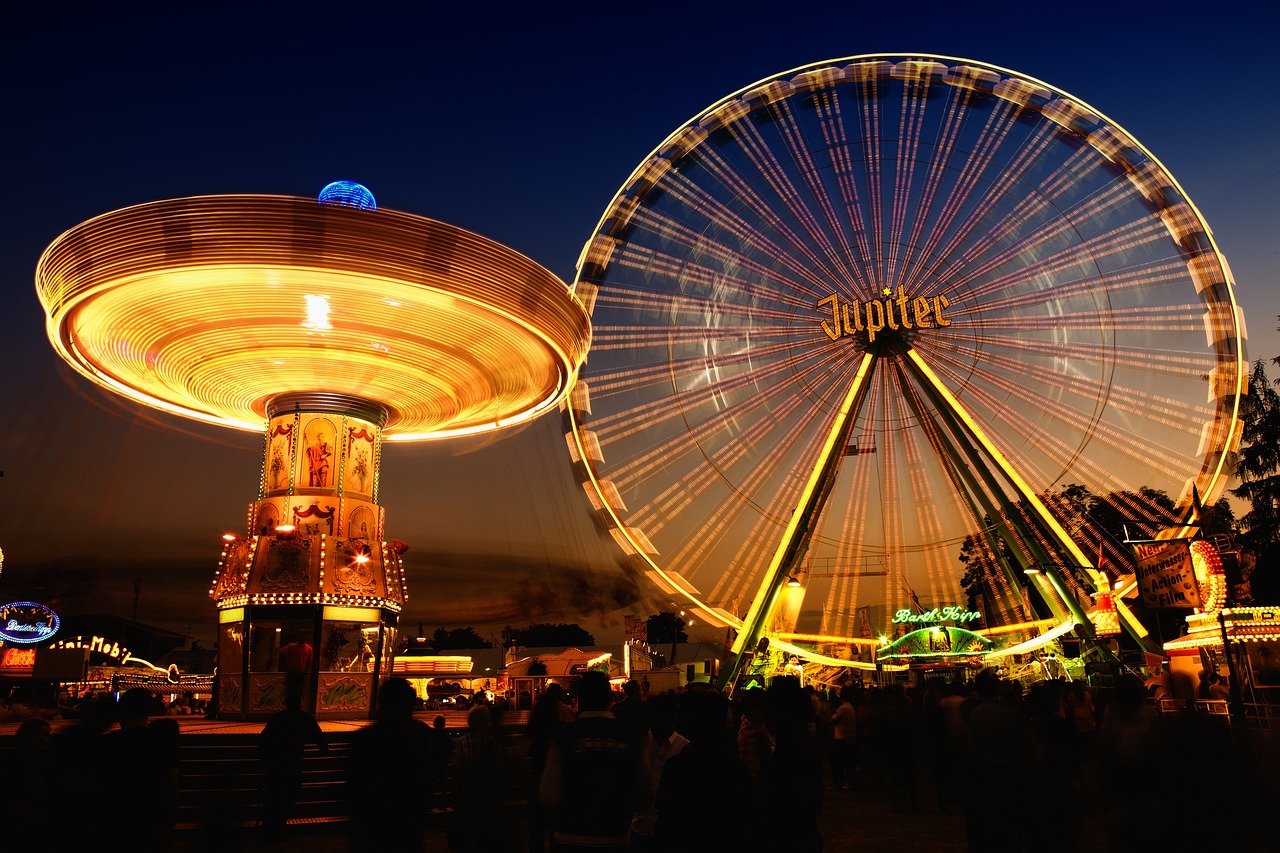 a ferris wheel and a ferris wheel at night, a picture, by Josef Dande, pixabay contest winner, beautiful day, widescreen, jc park, an ultra high definition