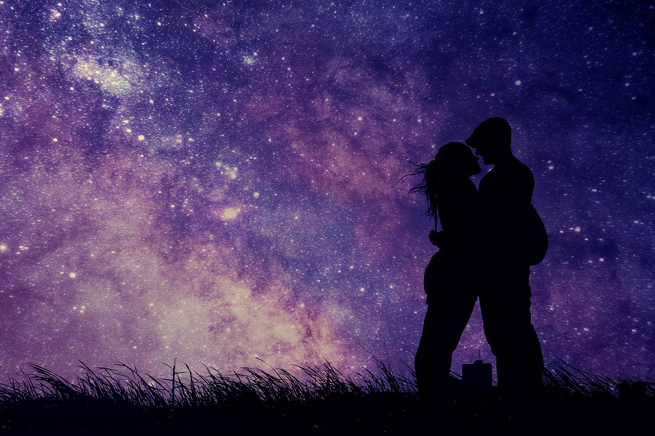 a couple kissing under a night sky full of stars, a picture, romanticism, violet sky, 1128x191 resolution, planets in the background, silhouettes in field behind