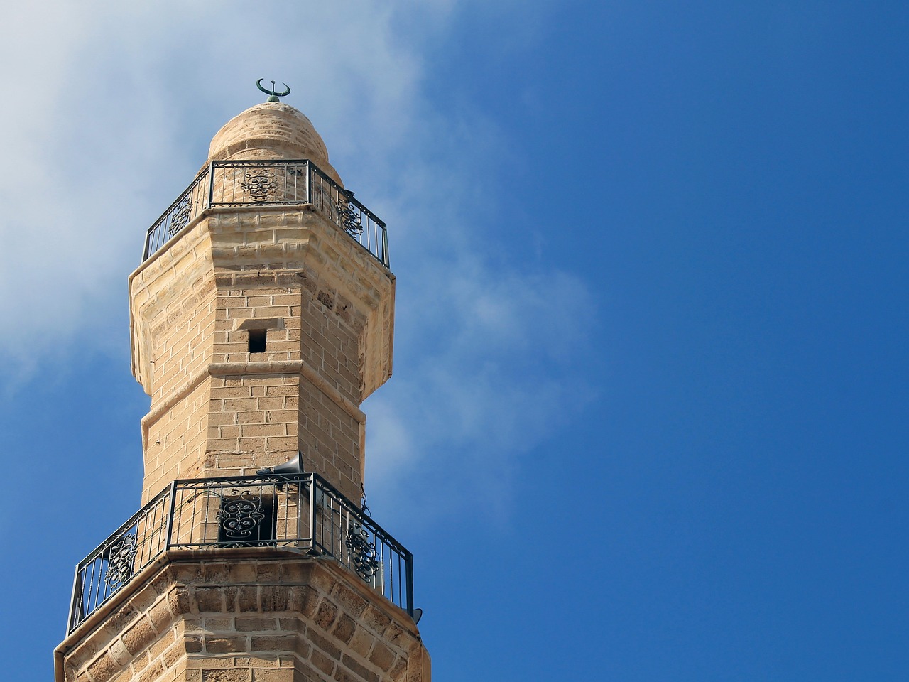 a tall tower with a clock on top of it, dau-al-set, old town mardin, closeup photo, lighthouse, israel