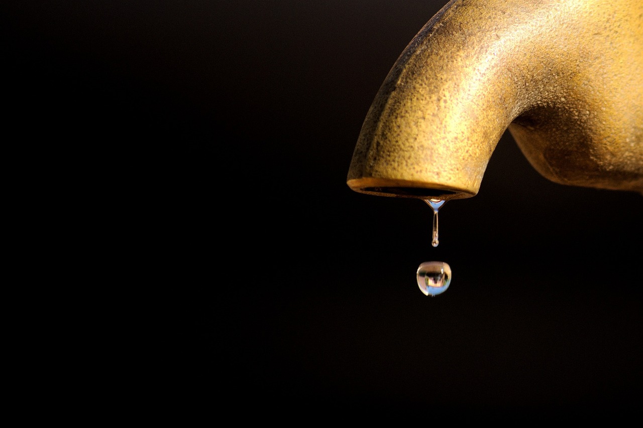 a faucet with a drop of water coming out of it, shutterstock, renaissance, gold, depressing, stock photo, deserted