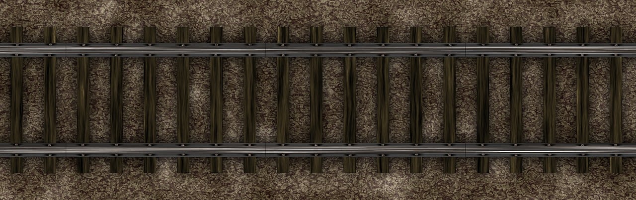 an overhead view of a set of train tracks, a digital rendering, old moist carpet, close photo
