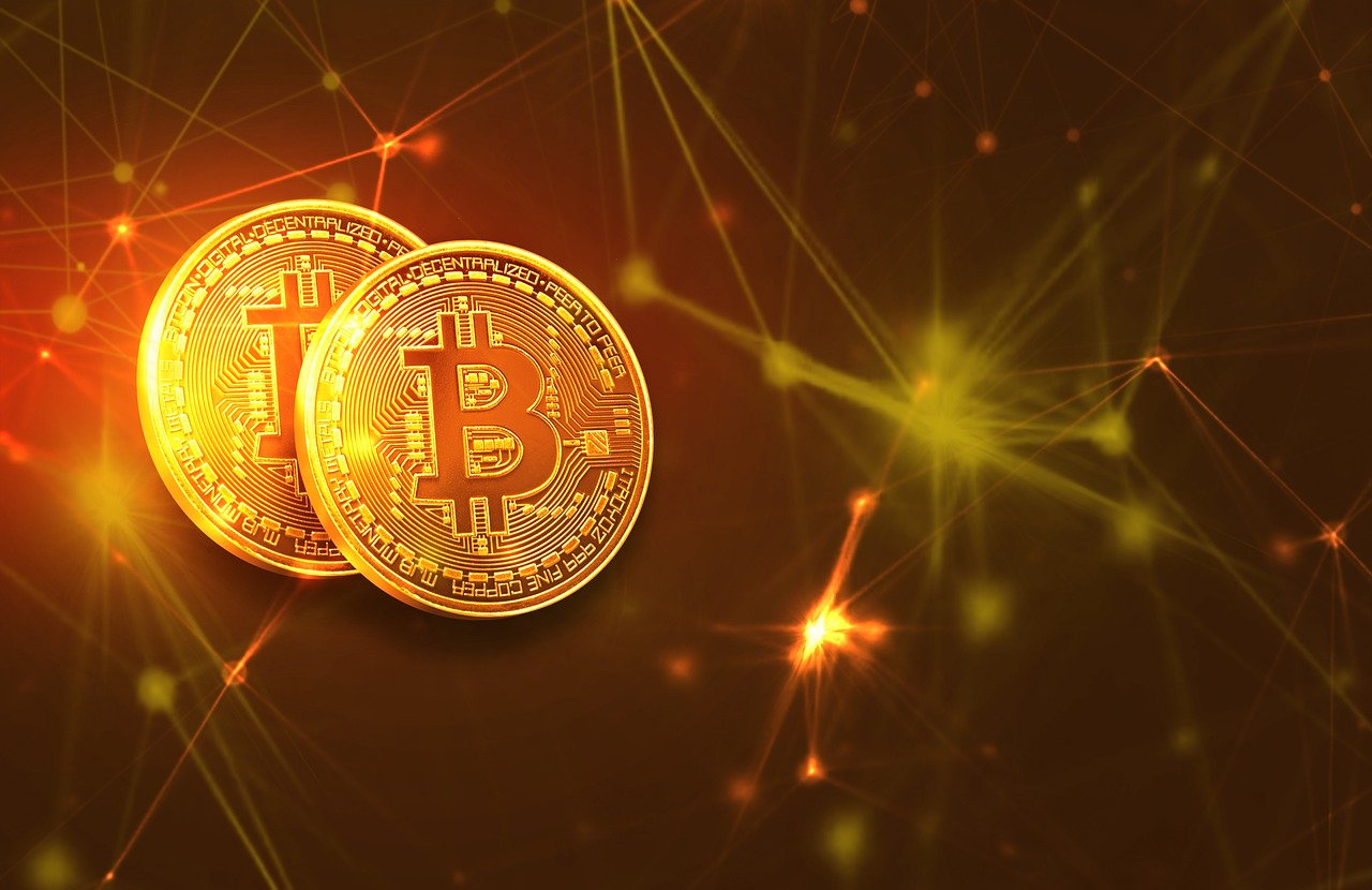 a couple of bitcoins sitting on top of each other, a digital rendering, by Robert Gavin, shutterstock, warm glow from the lights, volumetric lighting. red, digital banner, 💣 💥💣 💥