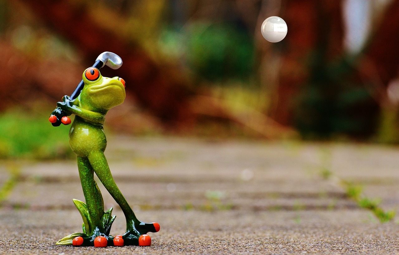 a figurine of a frog holding a baseball bat, a picture, by Zoran Mušič, pixabay contest winner, slim shady tennis ball monster, mid air shot, 2019 trending photo, vacation photo