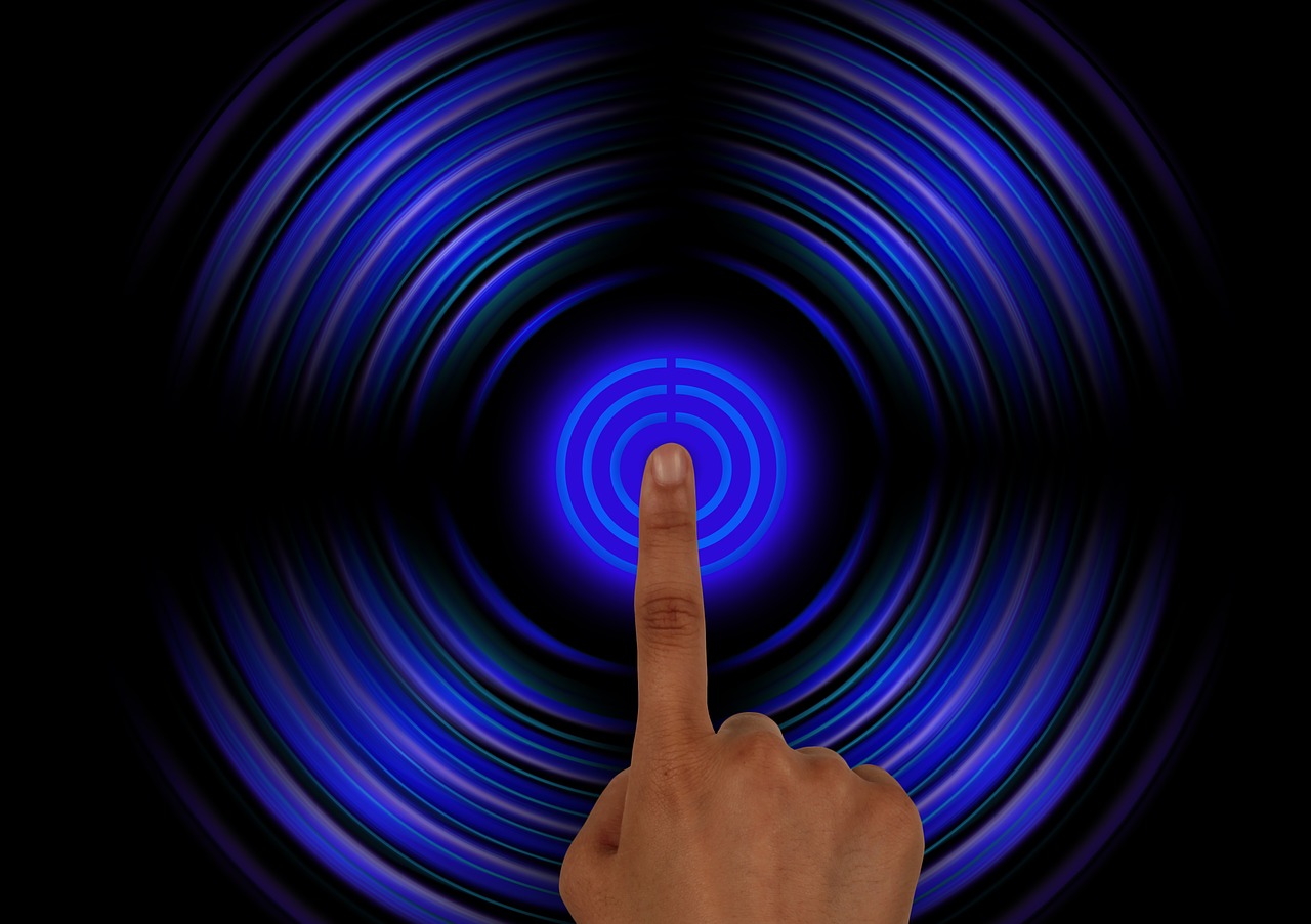 a close up of a person's finger with a blurry background, a stock photo, interactive art, doppler effect, blue neon, with pointing finger, radiating with power