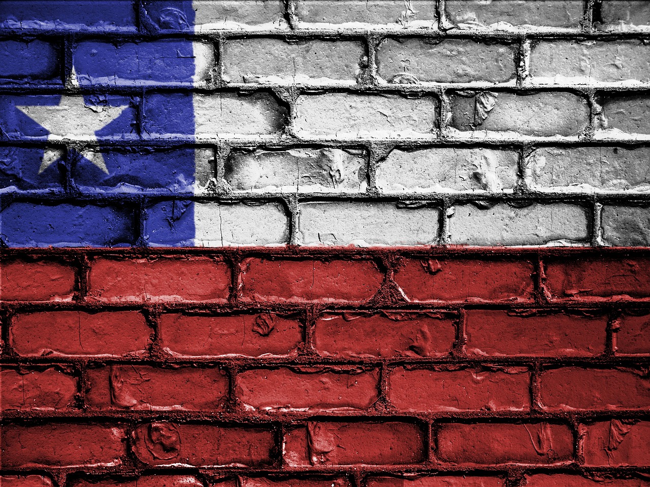 the texas flag painted on a brick wall, a photo, shutterstock, graffiti, chile, background image, trending photo, taiwan