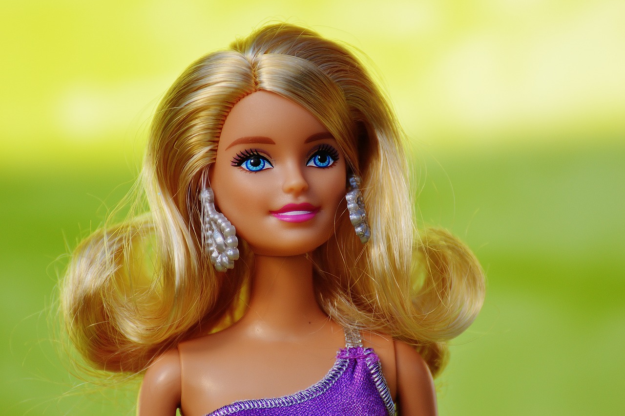 a close up of a barbie doll wearing a purple dress, a picture, by Mario Bardi, pixabay, blue-eyed, a super-smart, toy commercial photo, avatar image