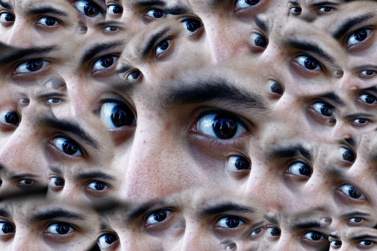 a close up of a man's face with many different eyes, inspired by MC Escher, pixabay, surrealism, eyes). full body realistic, spying, extreme closeup portrait, concerned expression