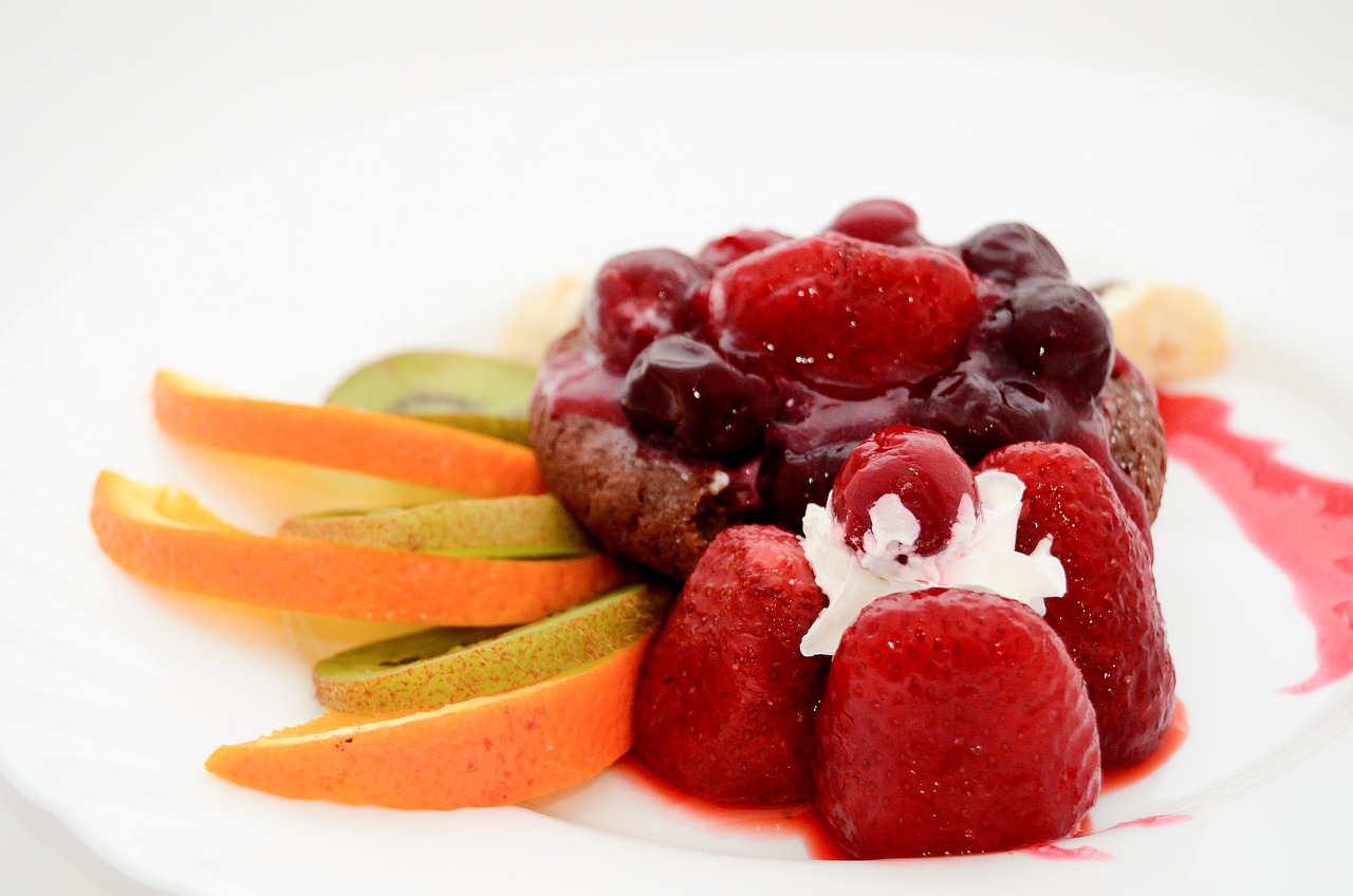 a close up of a plate of food with fruit, romanticism, kanamemo, bottom angle, chocolate, cheery