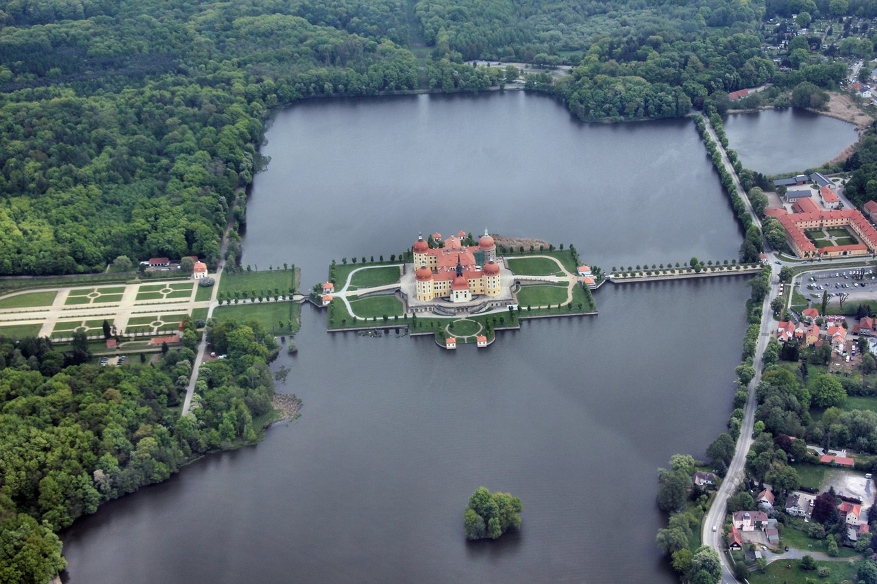 an aerial view of a castle in the middle of a lake, a photo, by Werner Gutzeit, flickr, zdzisław, view from helicopter, version 3, ny