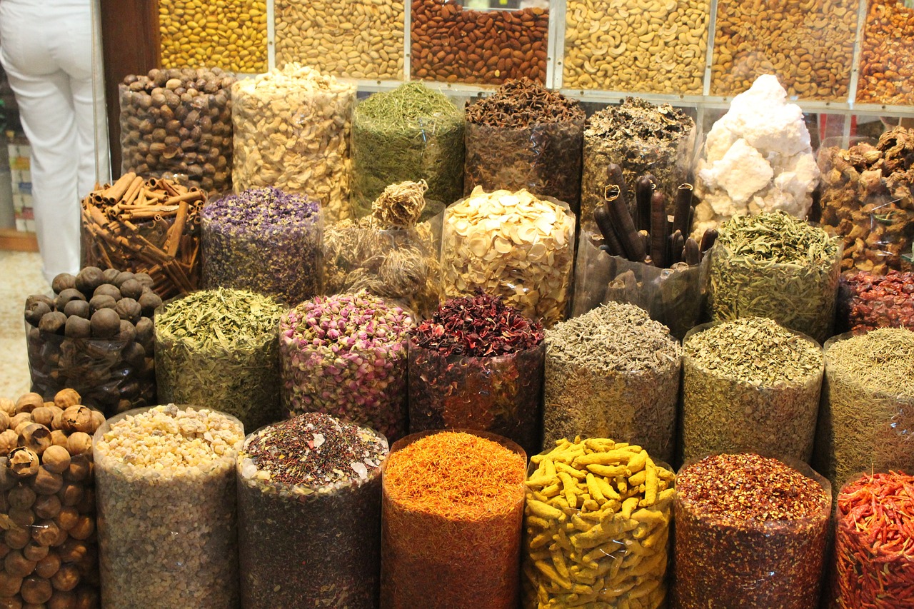 a display filled with lots of different types of nuts, by Edward Ben Avram, pexels, renaissance, dubai, bottles of spices, herbs and flowers, 3 2 x 3 2