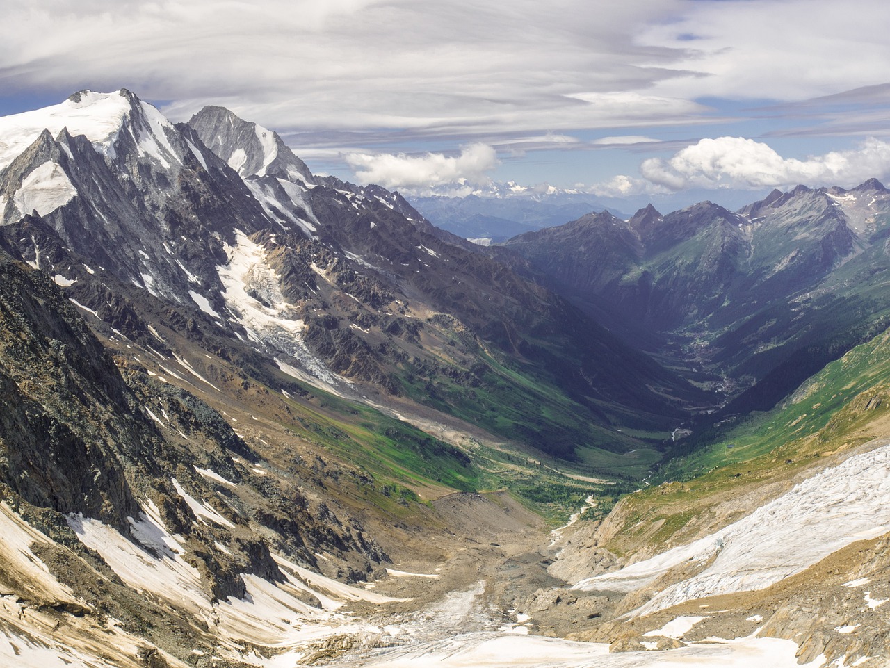 a group of people standing on top of a snow covered mountain, a tilt shift photo, by Matthias Weischer, shutterstock contest winner, valley in the distance, summer day, 4 k cinematic panoramic view, high angle vertical