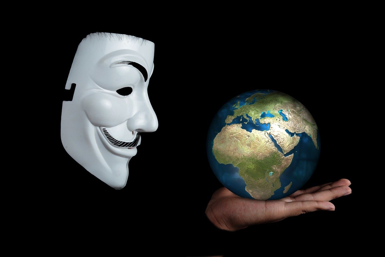 a person holding a white mask over a globe, a picture, pixabay, hacker, theater mask, anonymous as a sausage, revolutionary