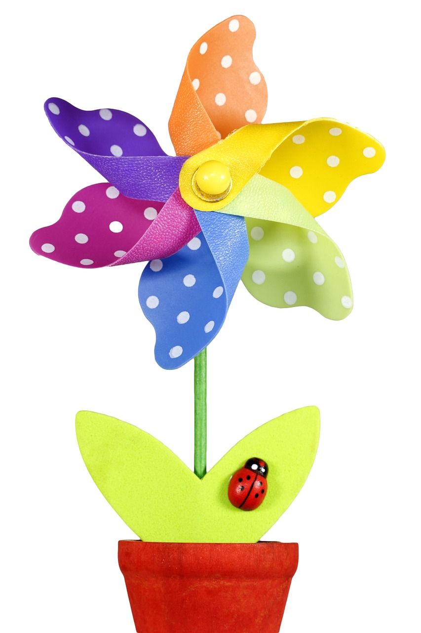 a close up of a flower with a ladybug on it, a pastel, kinetic art, official product photo, windmill, polka dot, -h 1024