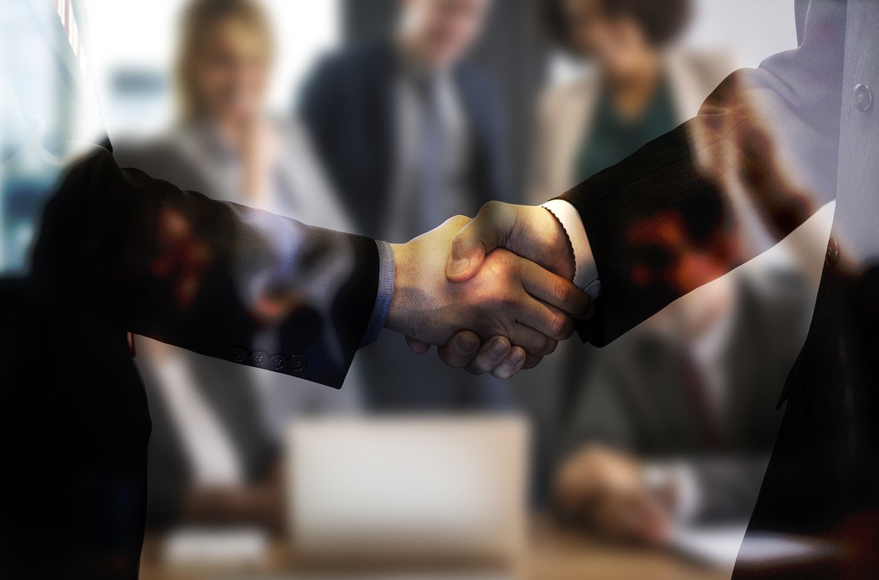 two men shaking hands in front of a group of people, a picture, by Mirko Rački, shutterstock, realism, blurred and dreamy illustration, stock photo, in a meeting room, realistic cinema 4 d render