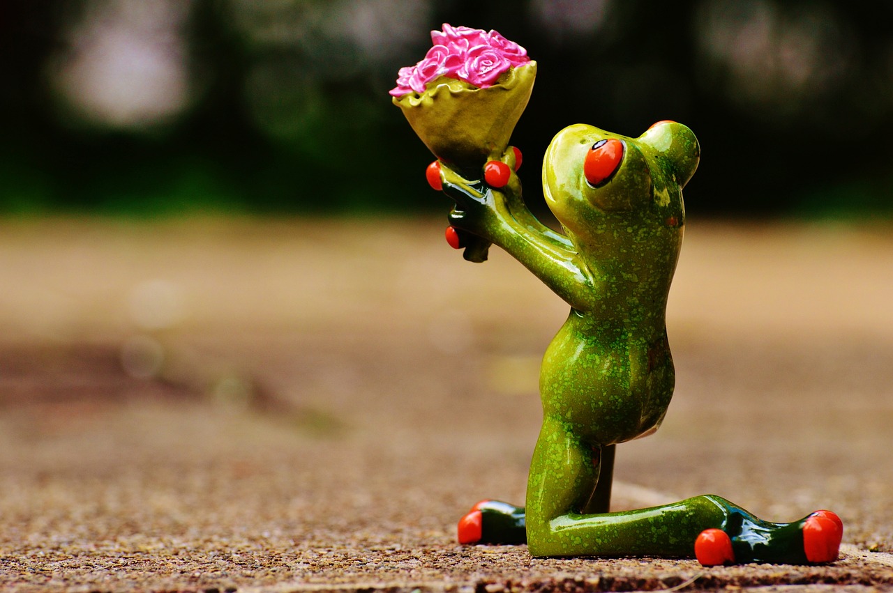 a figurine of a frog holding a flower, pixabay contest winner, romanticism, on his hind legs, rosses, snacks, love is begin of all