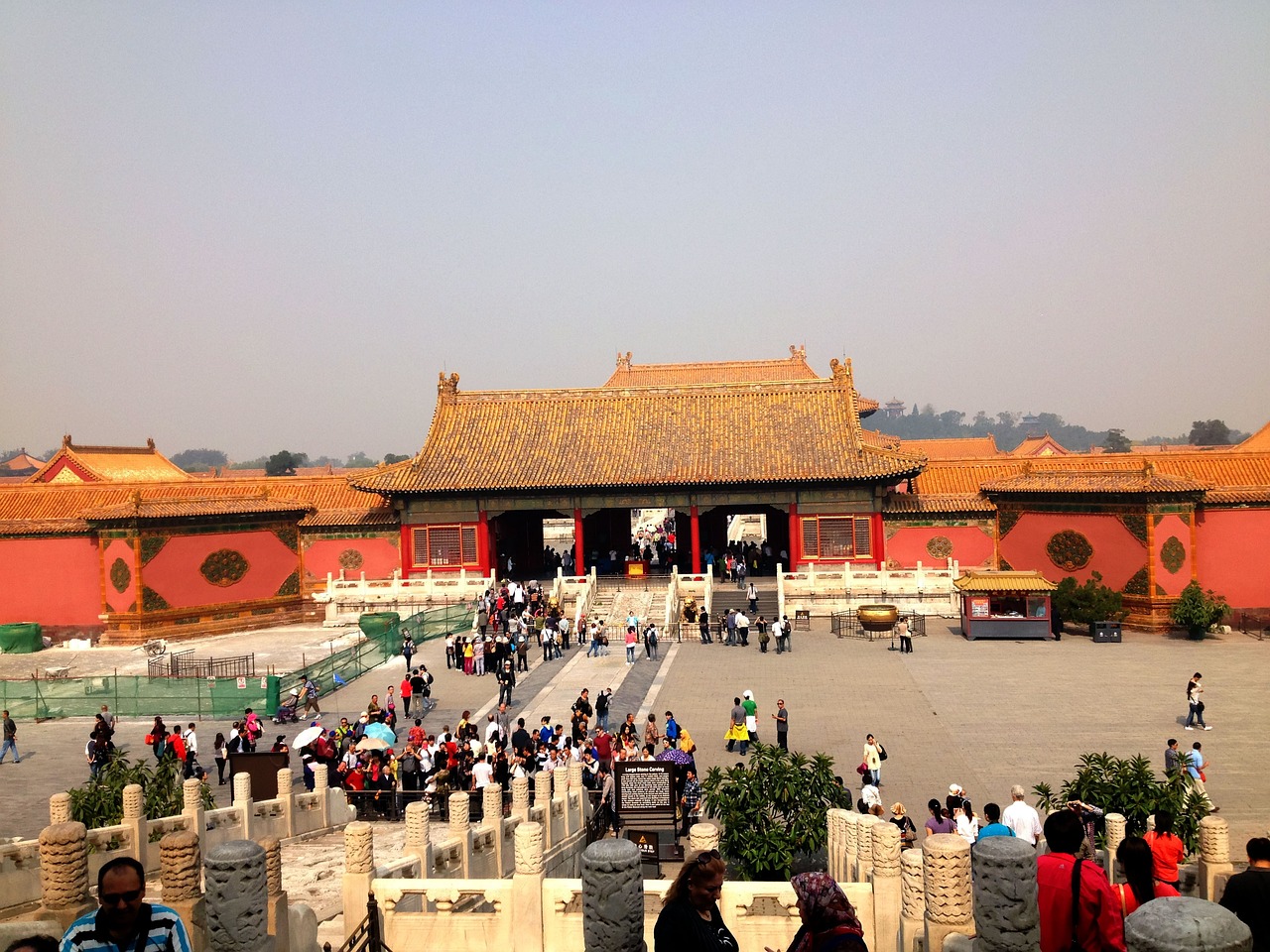 a group of people standing in front of a building, by Weiwei, happening, ancient china art style, huge gate, sunny day, very busy place