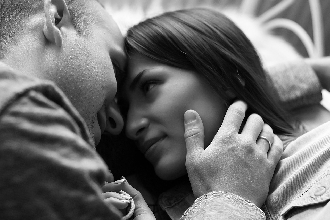 a black and white photo of a man and a woman, a black and white photo, pexels, romanticism, closeup!!!!!!, hug, maxim sukharev, photorealistic photo