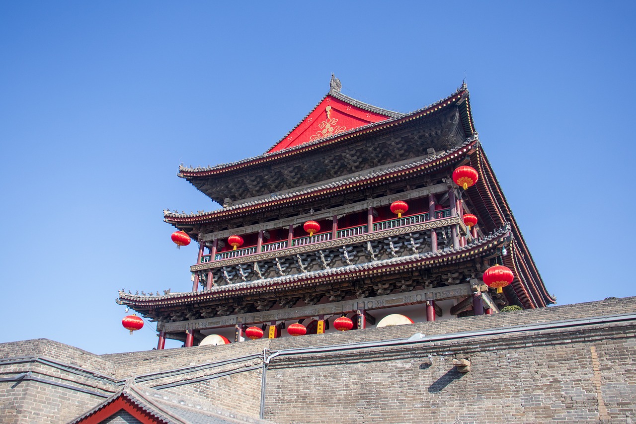 a tall building with red lanterns on top of it, inspired by Zhang Sengyao, mingei, high definition photo, torri gate, tourist photo, 2 0 2 2 photo
