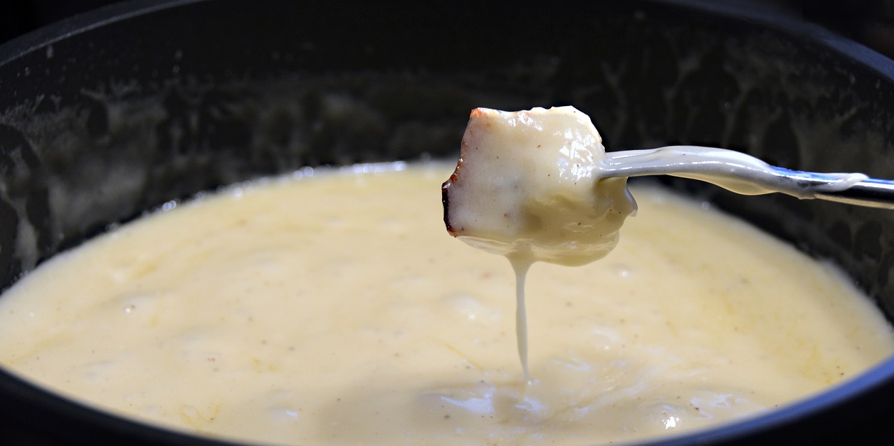 a close up of a spoon with cheese on it, by Thomas Häfner, dau-al-set, good soup, skewer, pus - filled boils, albino